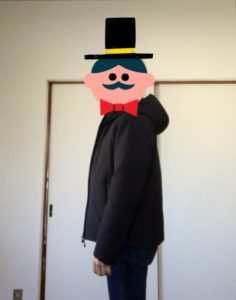 ジャーナルスタンダードのダウンを着た横を向く男性