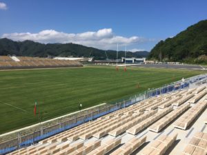 自然に囲まれた釜石鵜住居復興スタジムの写真